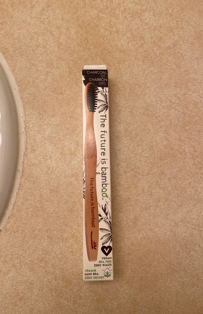 BNIB charcoal Infused Toothbrush photo 1