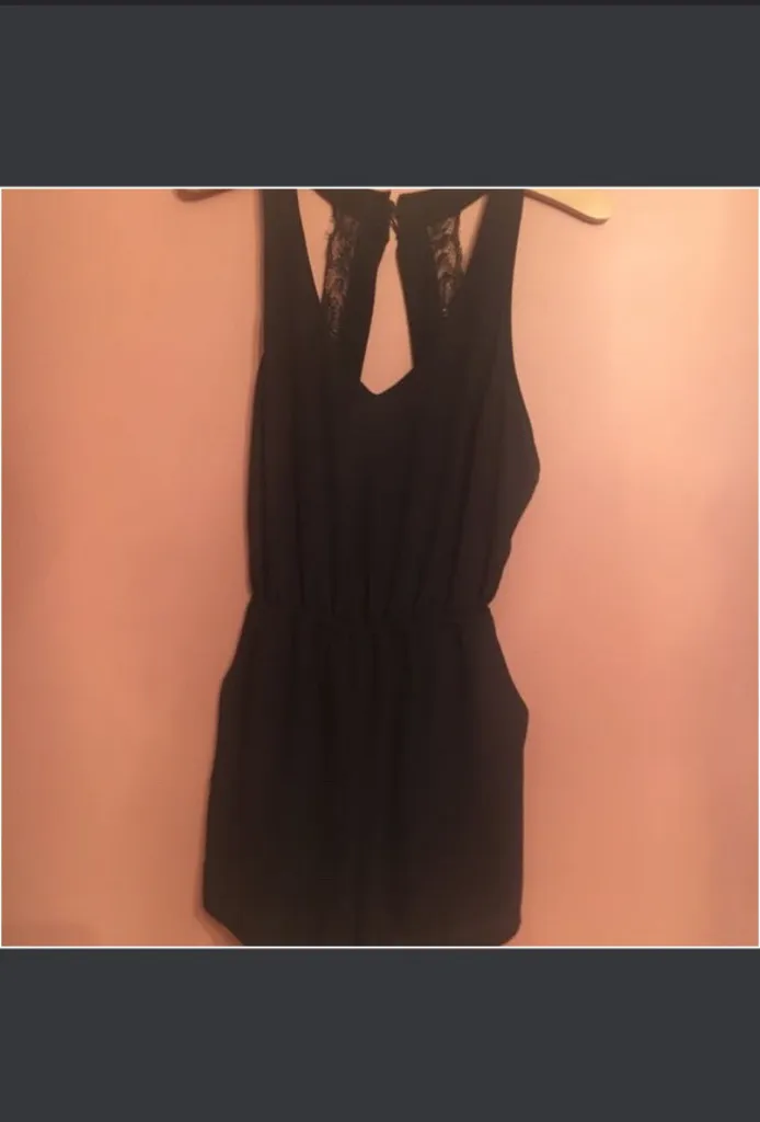 Black open back romper photo 1