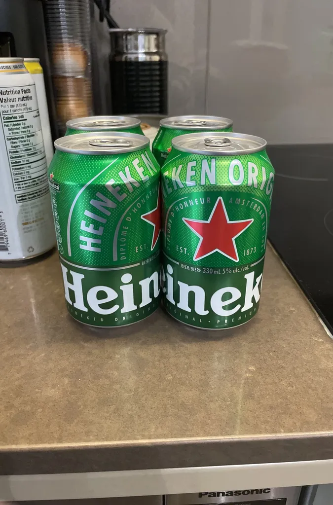 4 Heineken cans photo 1