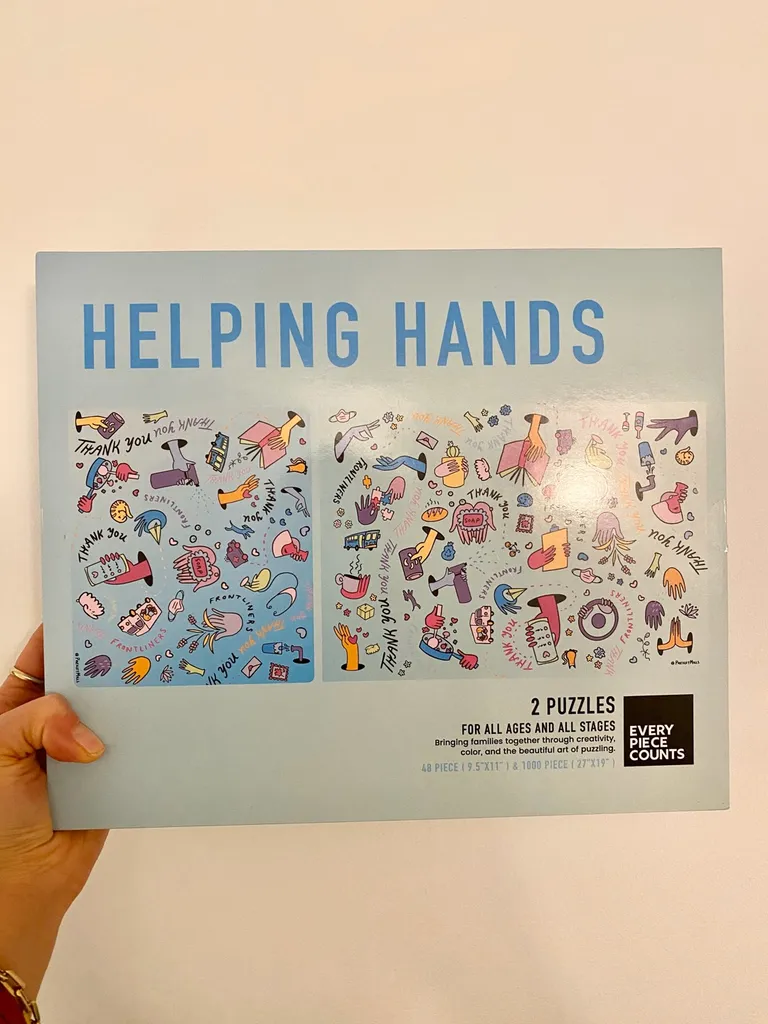 New And Sealed Helping Hands Puzzle photo 1