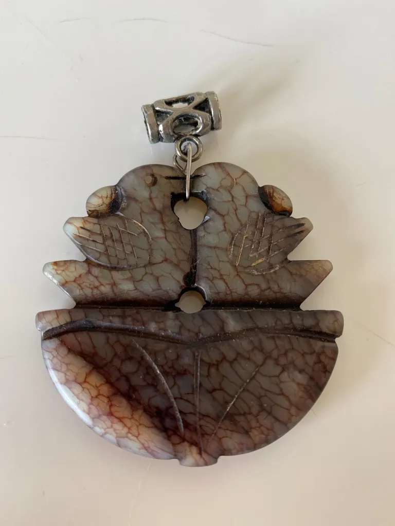Carved Stone Pendant photo 1