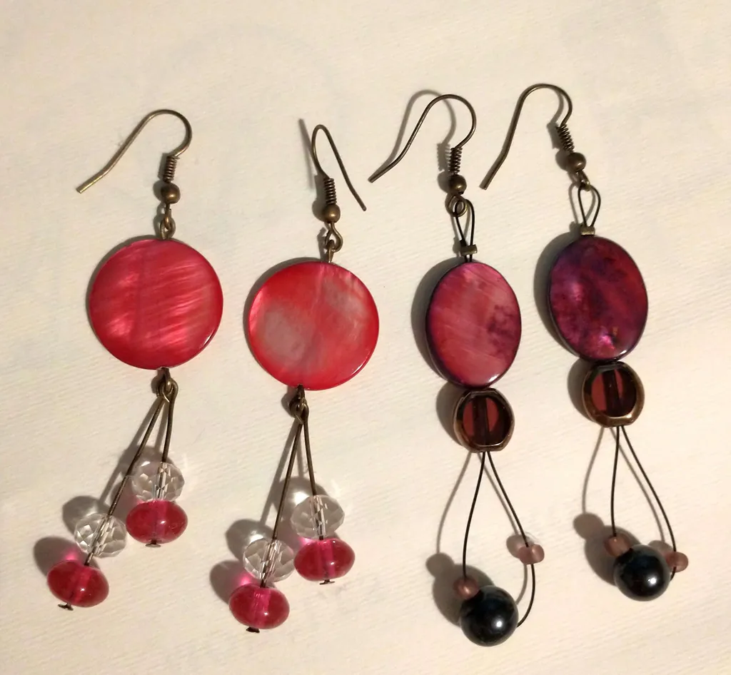 2 Pairs of super cute dangly earrings photo 1