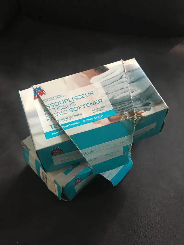 2 boxes of nearly full fabric softener sheets photo 1