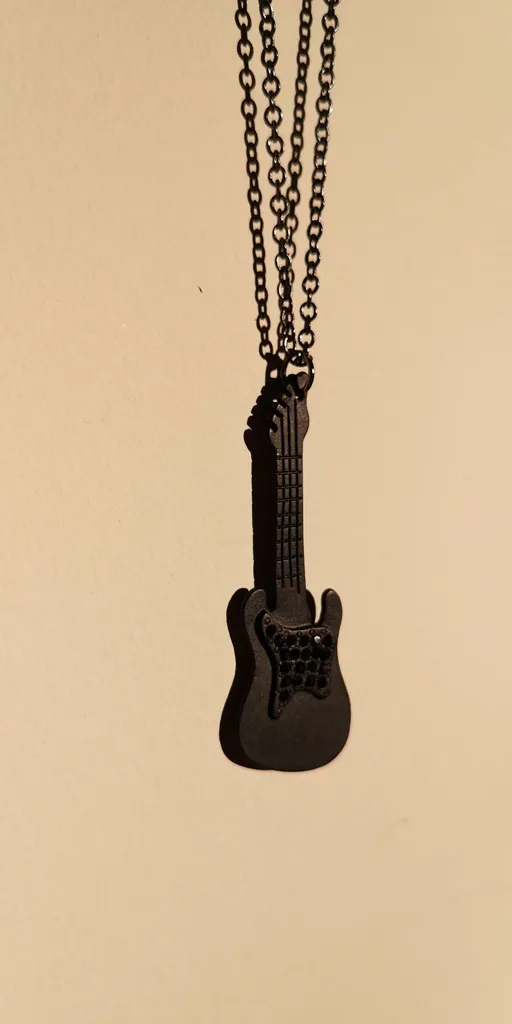 Matte Black Guitar Necklace photo 1
