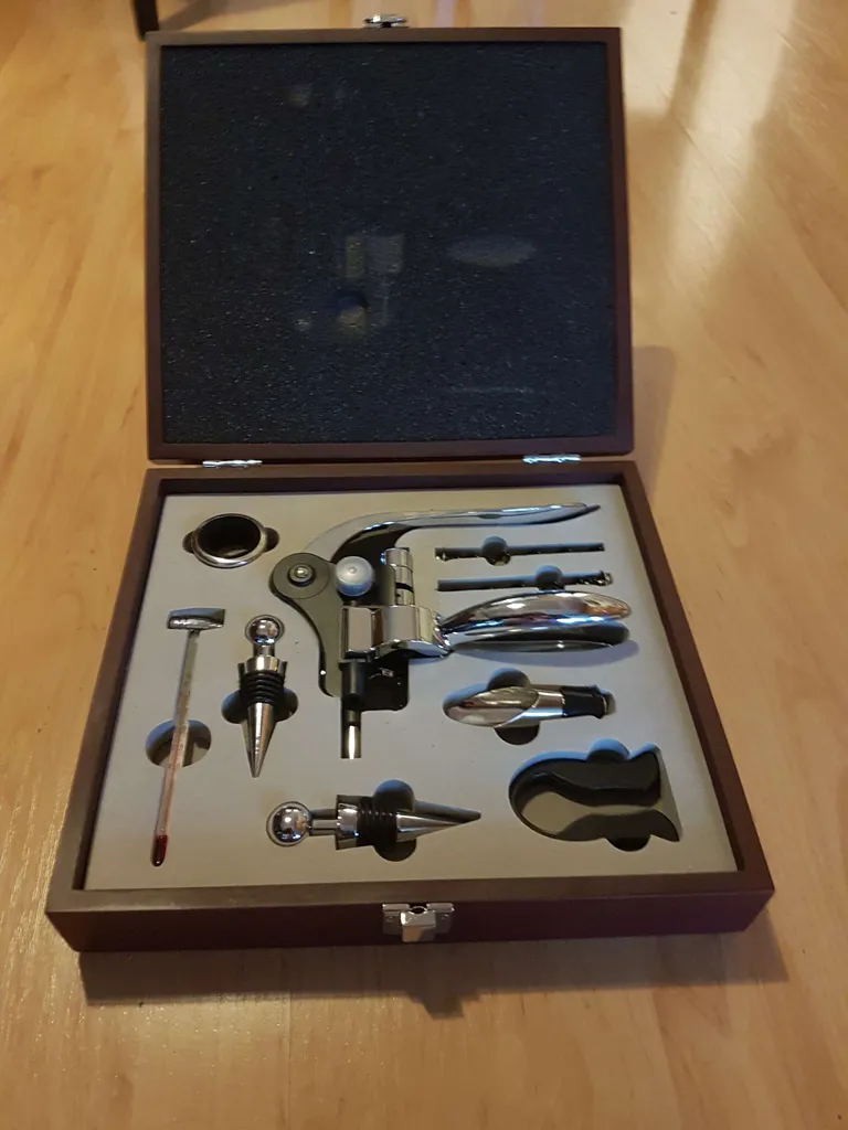 Wine opener set in wooden box photo 1