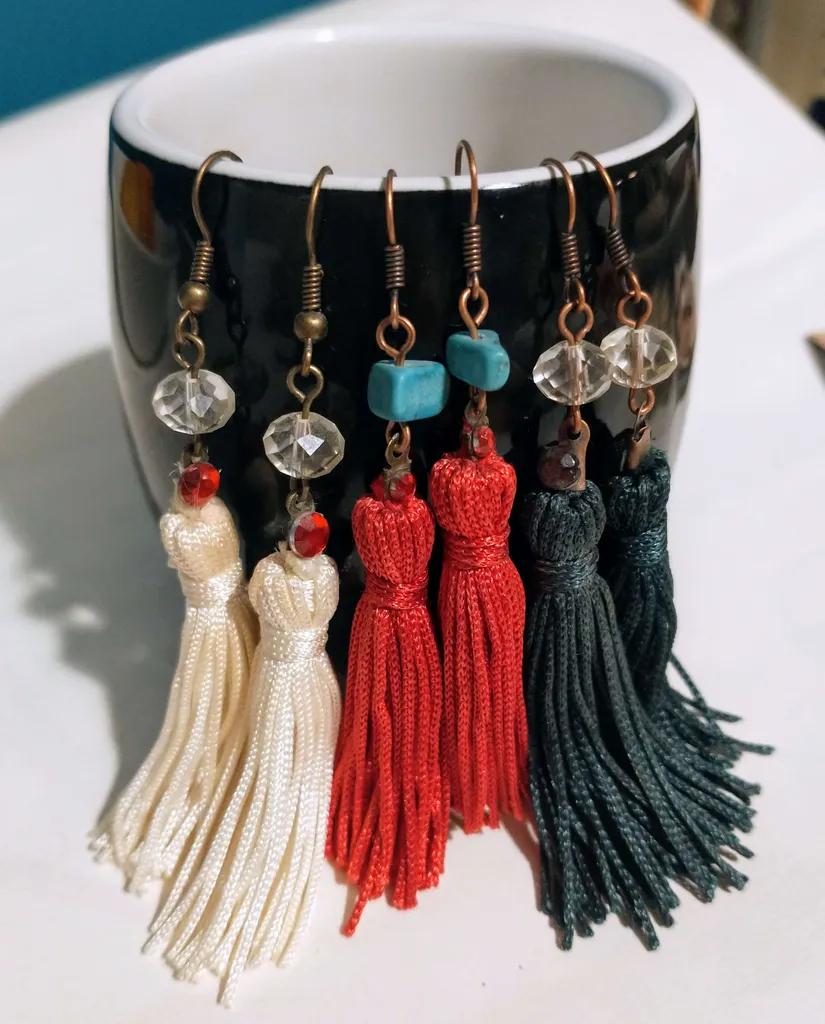 3 Pairs of dangly earrings photo 1