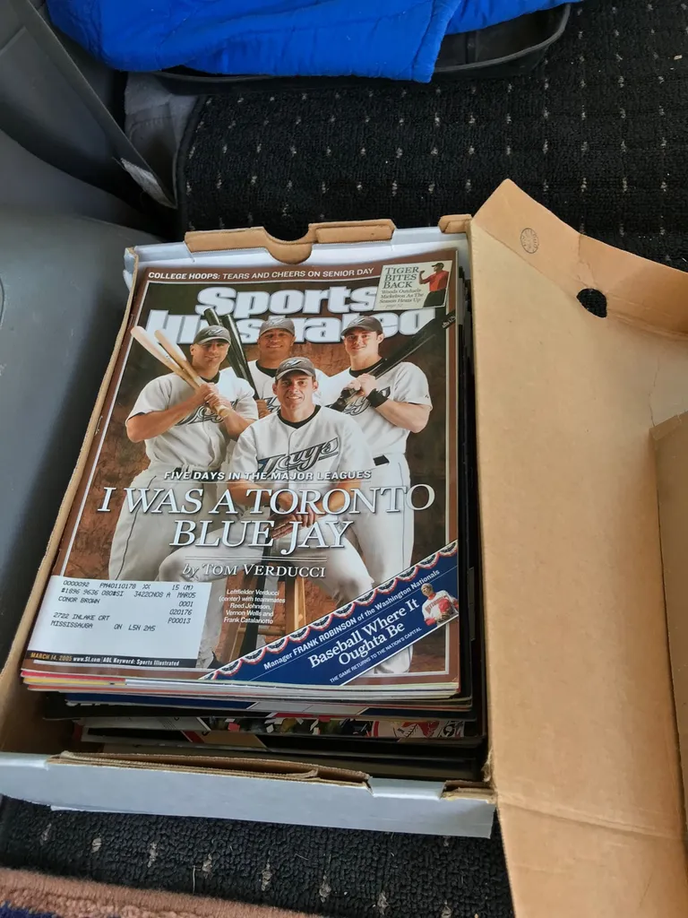 A Bunch Of Different Sport Magazines photo 1