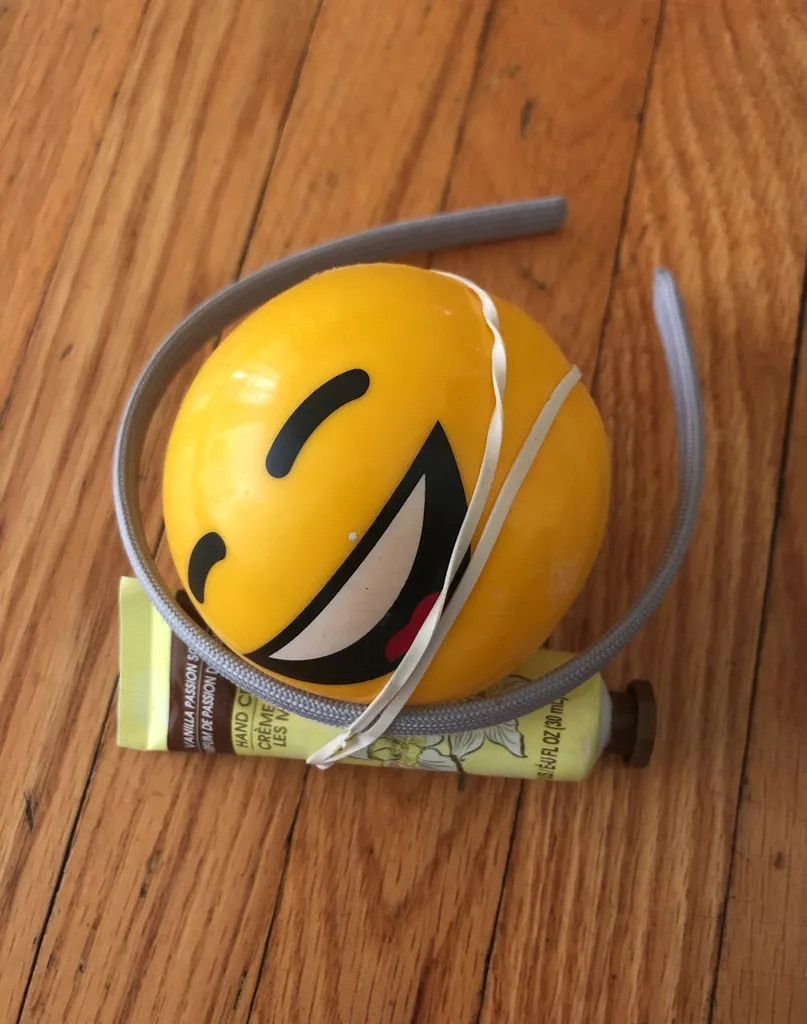 Hand cream, Headband, And Smiley Ball. photo 1