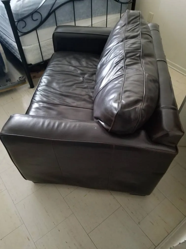 Dark brown leather 2-seat sofa bed photo 1