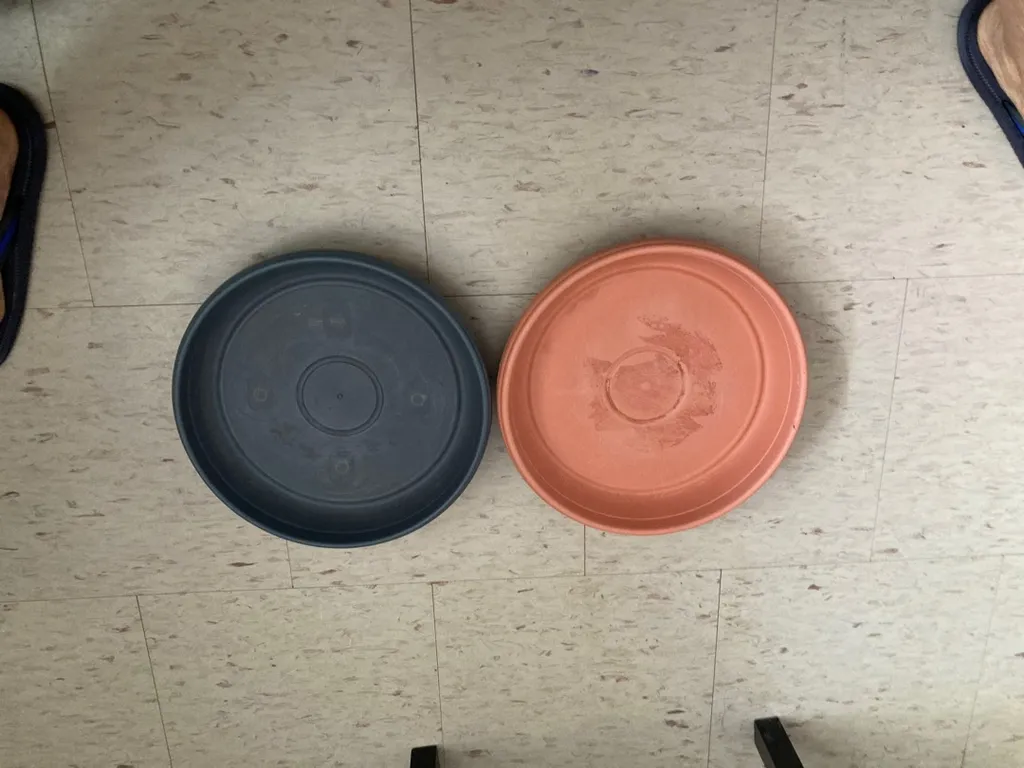 Two Plastic Saucers 7” photo 1