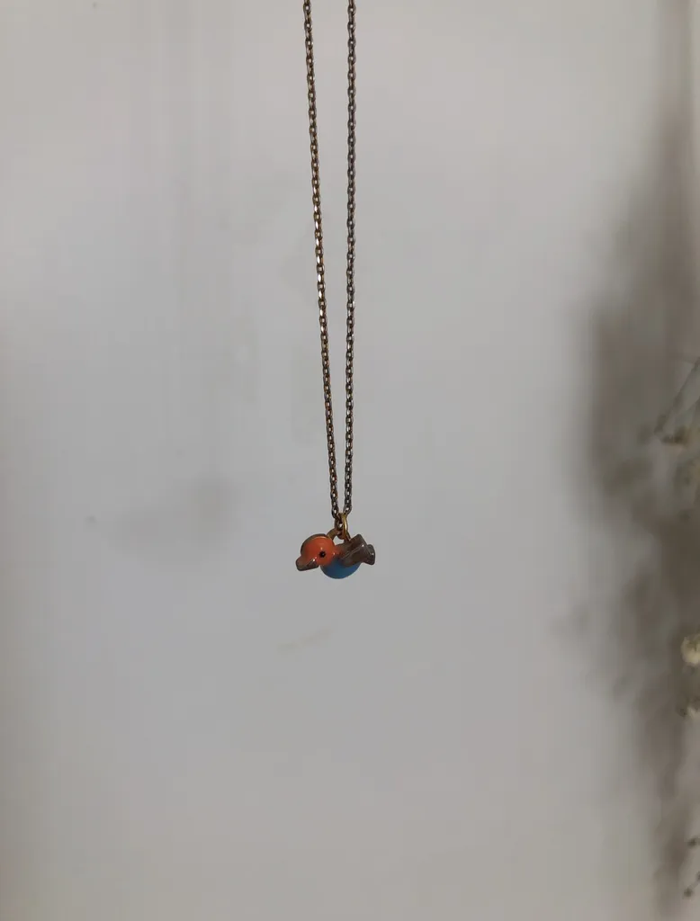 small bird necklace photo 1