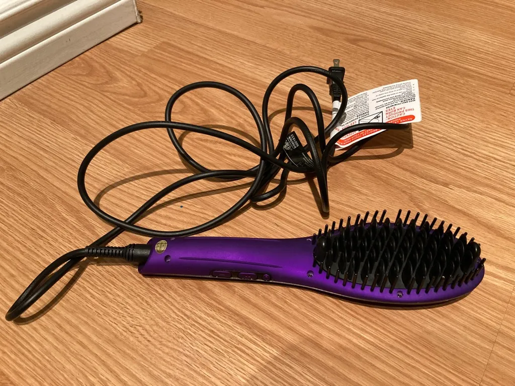 Heated Hair-straightening Brush photo 1