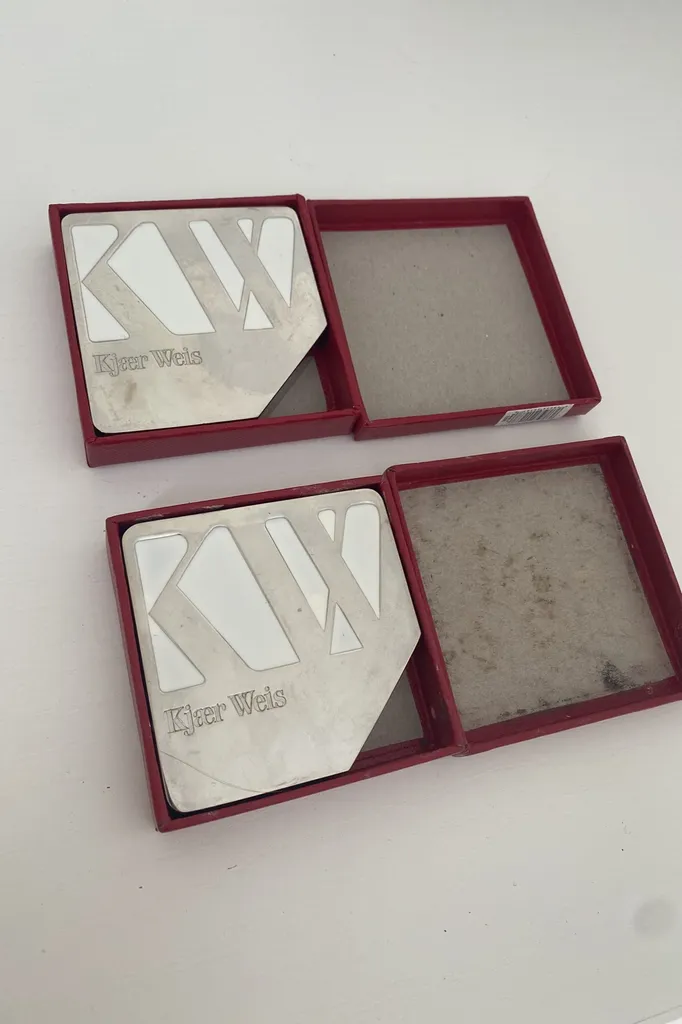 Kjaer Weis Empties photo 1