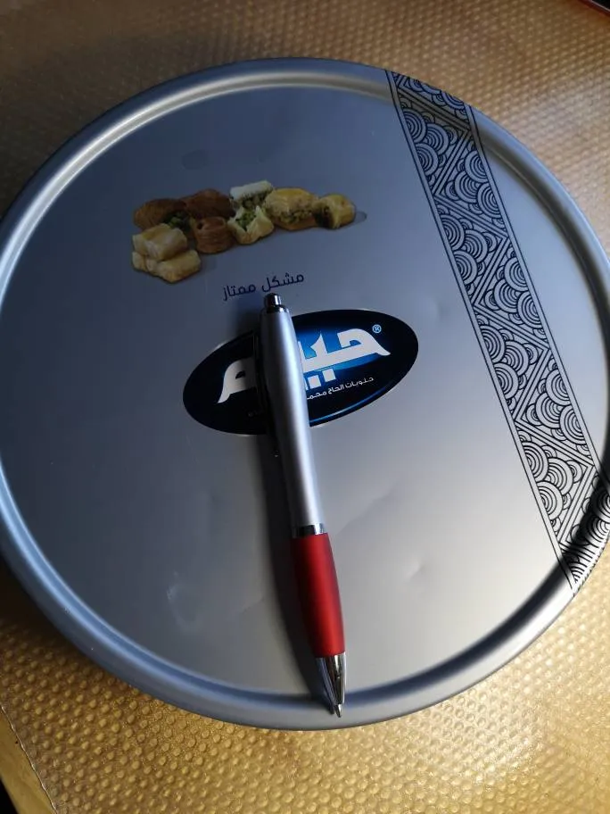 Empty round tin photo 1