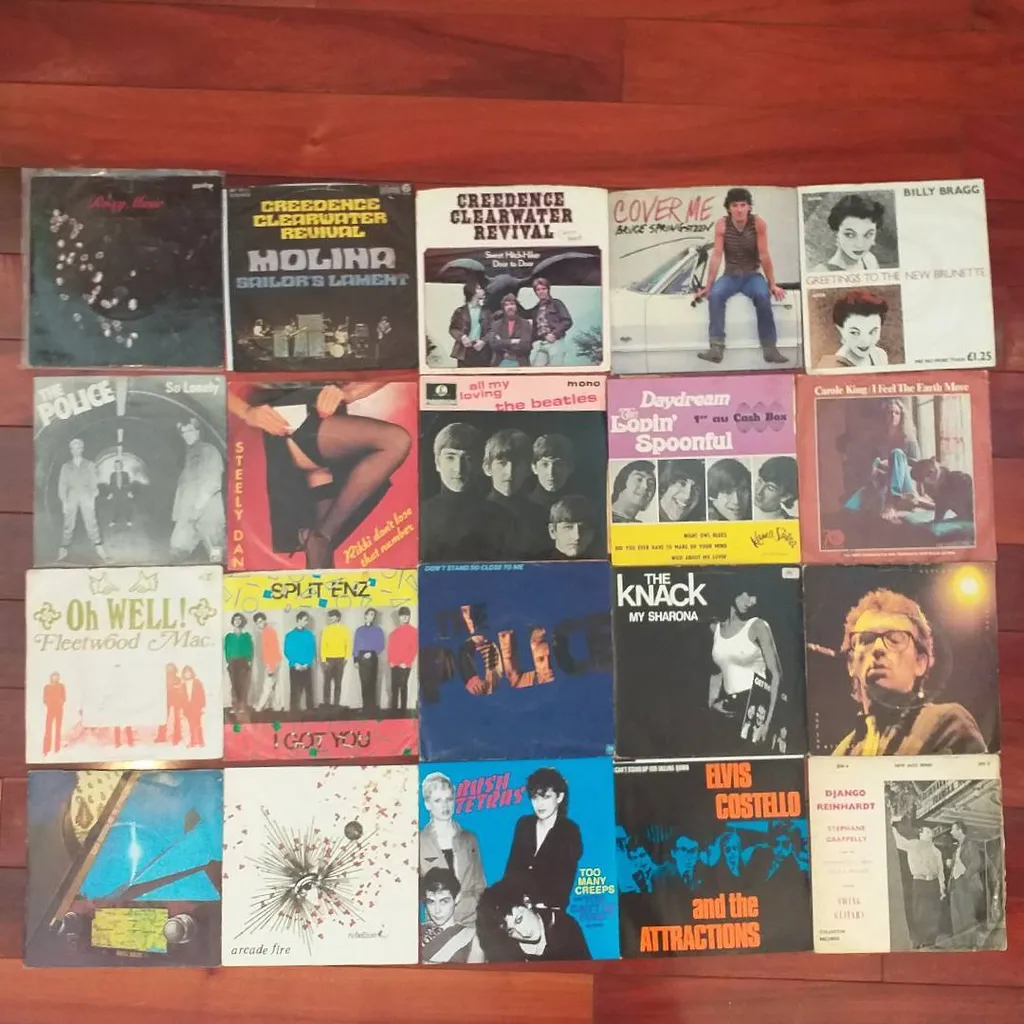 7" Vinyl Records With Picture Sleeves 45 Rpm Elvis Costello T... photo 1