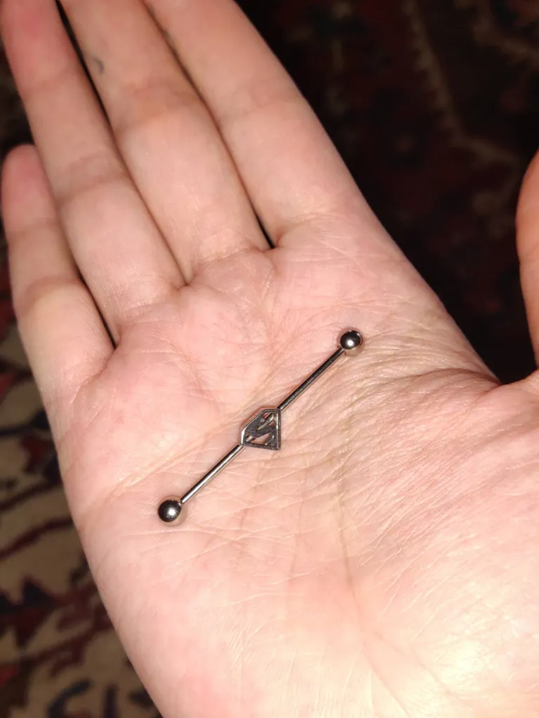 🍍Industrial barbell piercing photo 1