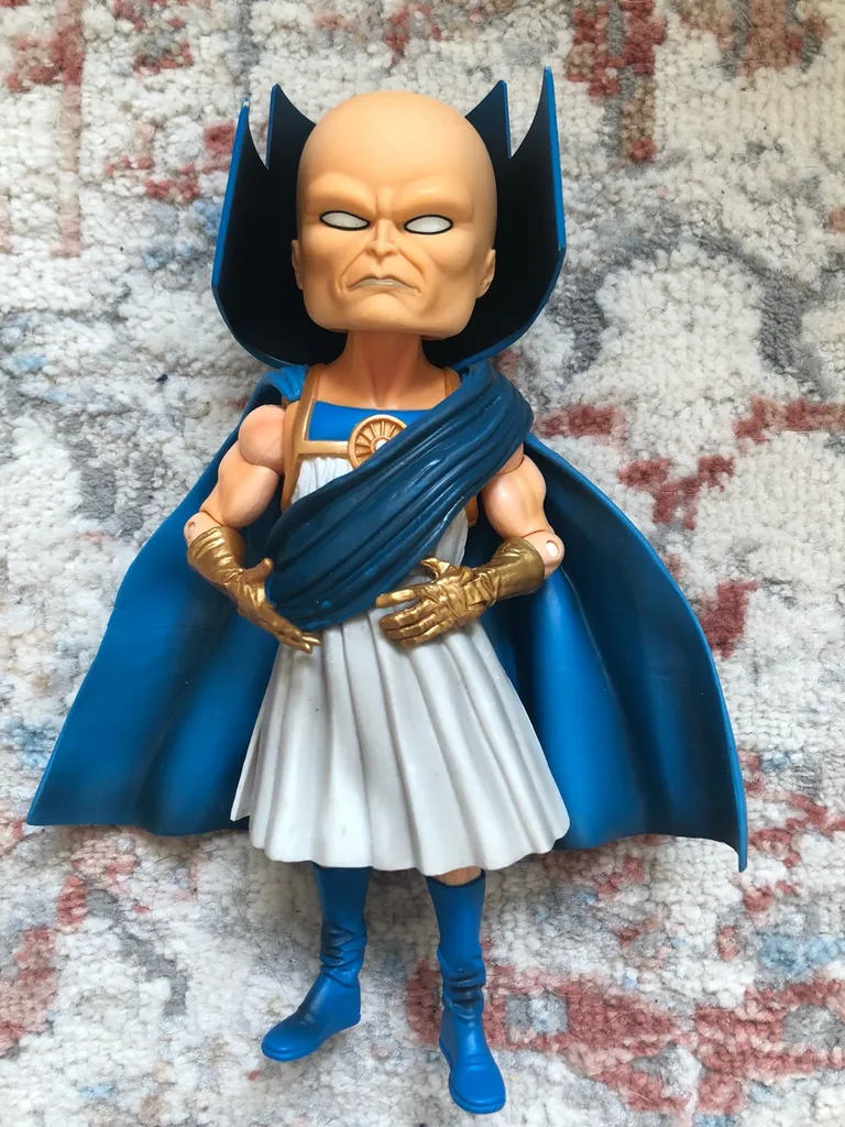 The Watcher Figure photo 1