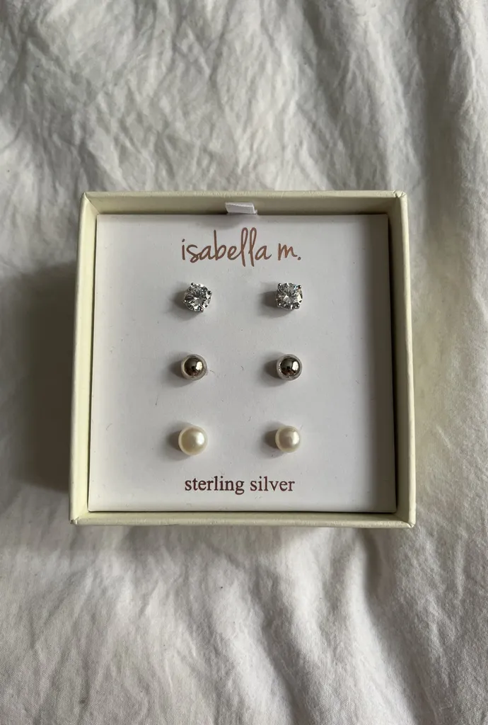BNIB sterling silver stud earrings. photo 1