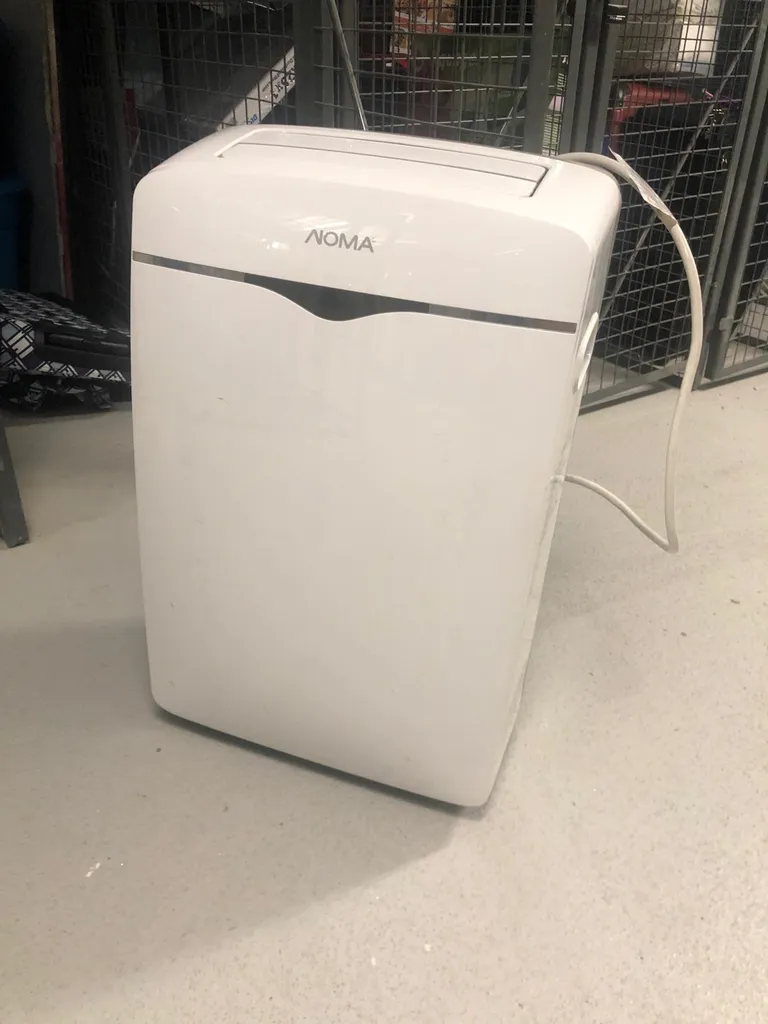Portable AC Unit And Dehumidifier, 9,000 BTU photo 1