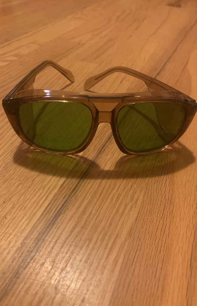 brown and green plastic safety sunglasses photo 1
