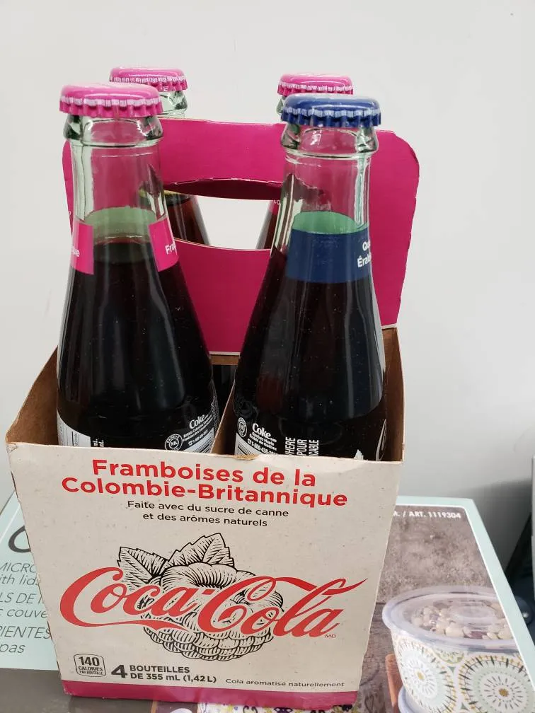 4 New Coke Bottles photo 1