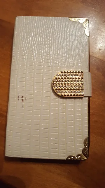 Slightly Used White Faux Leather Wallet Case SAMSUNG S4 photo 1