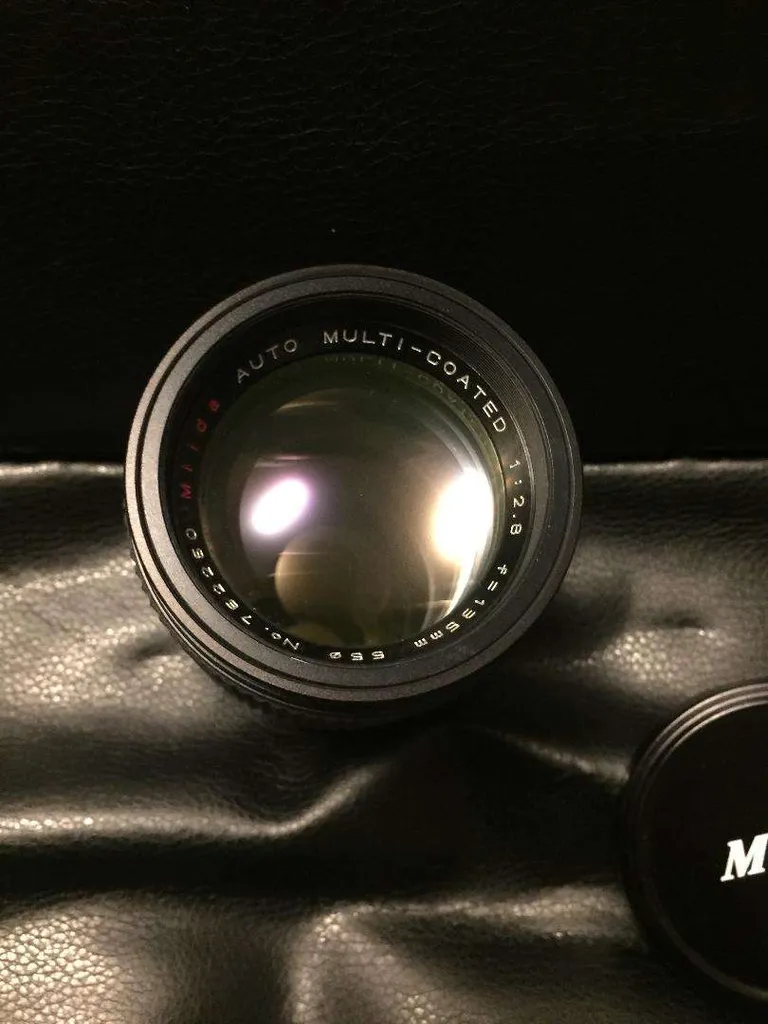 Milda 135mm portrait lens photo 1