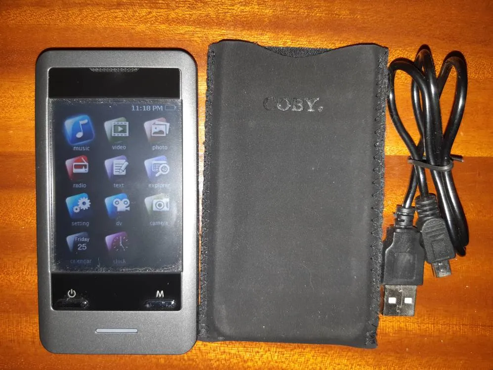 Coby 8GB 2.8-Inch Video MP3 Player With Touch Screen, FM Tune... photo 1