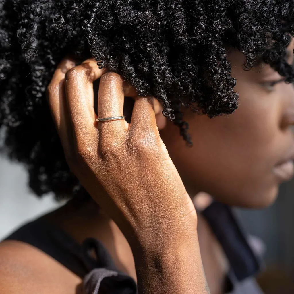 Twist Ring In Sterling Silver photo 1