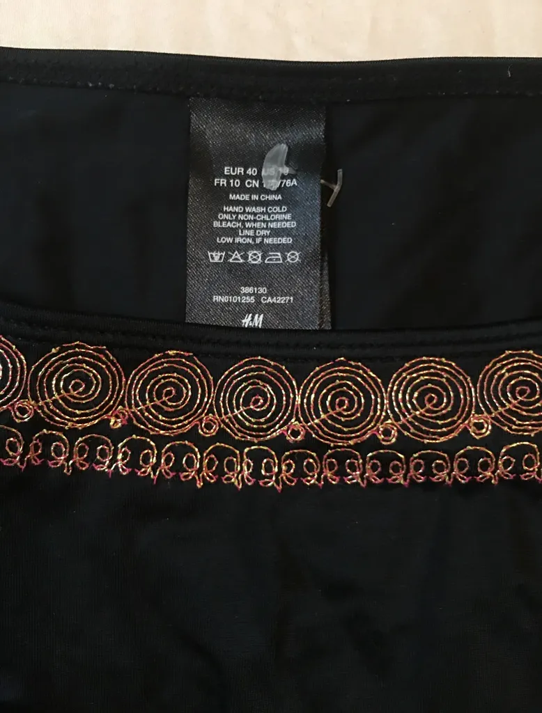 Black Bikini Bottoms With Side Ties and Border photo 1