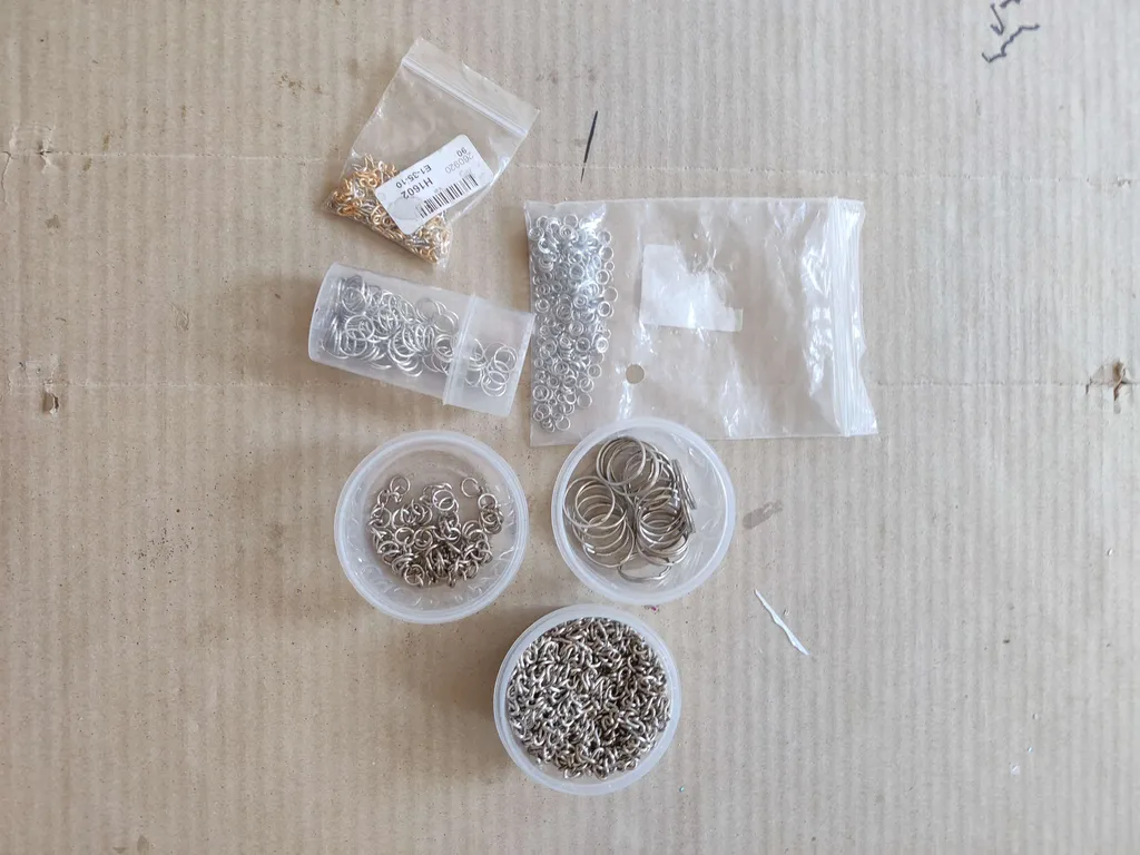 TONS of jump rings/ key chains/ eye hooks photo 1