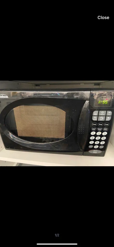 Repost! Small Black Microwave photo 1