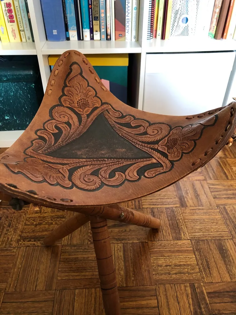 Still available - vintage leather ‘cow person’ stool photo 1