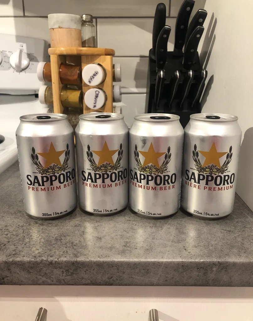 Four Cans Of Sapporo Beer photo 1