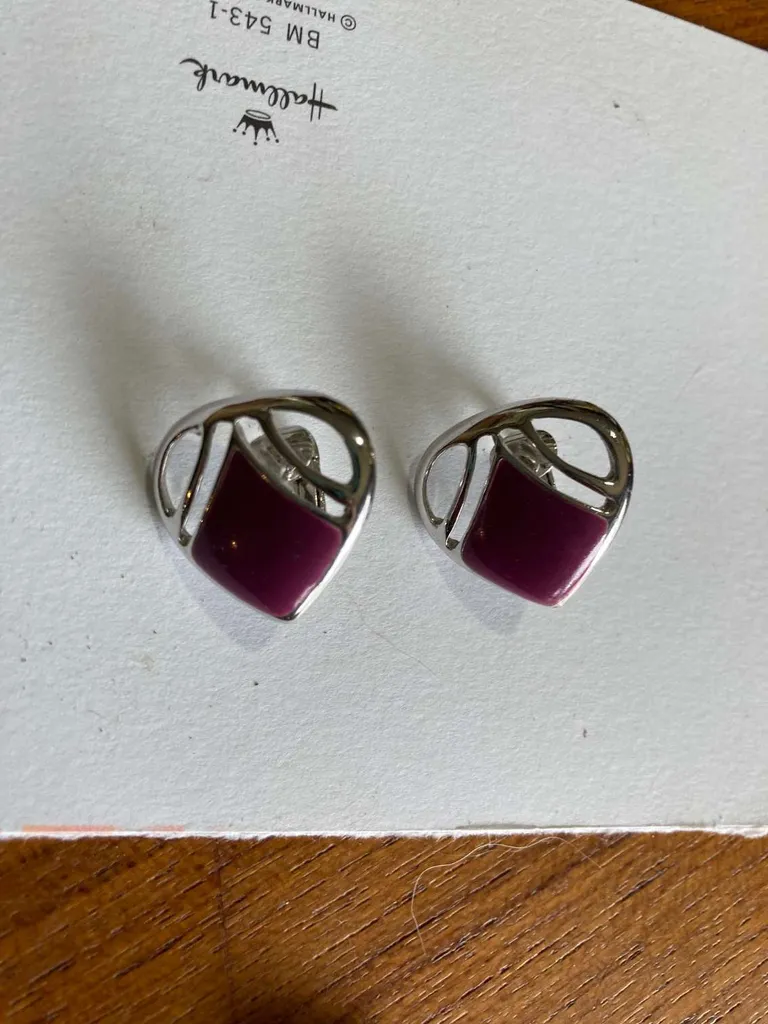 Silver and purple clip ons photo 1