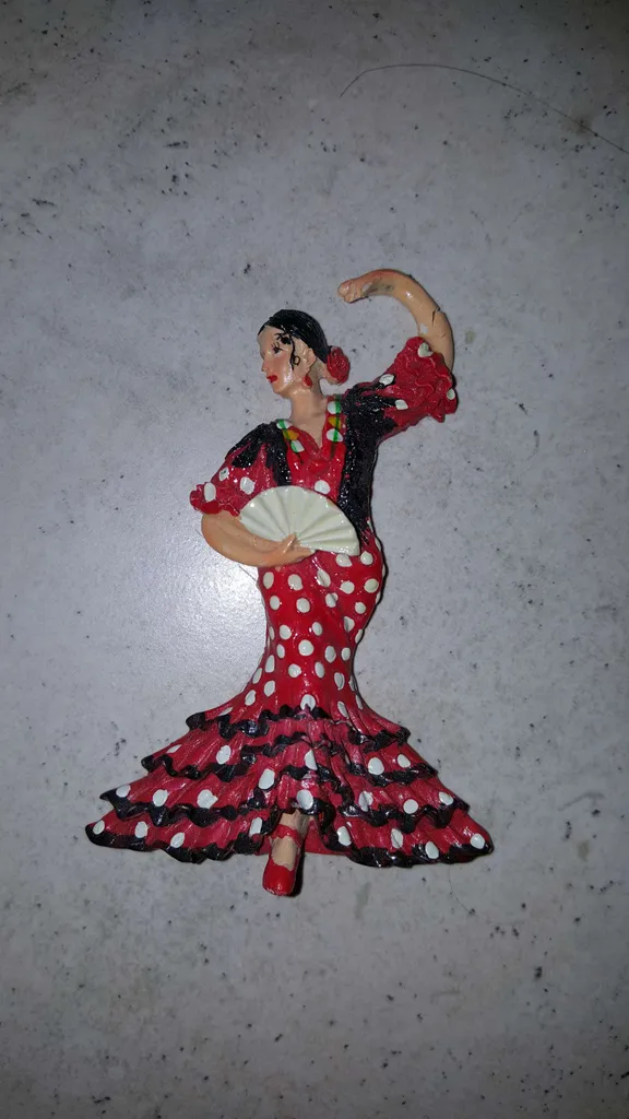 Dancing Spanish Lady -- Used to be a magnet but the magnet fe... photo 1