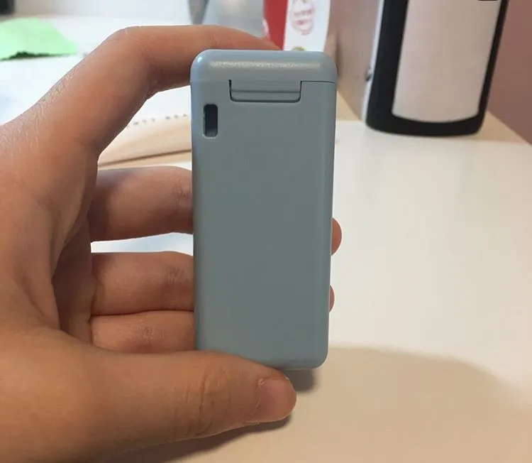 blue foldable, reusable metal/silicone straw photo 1