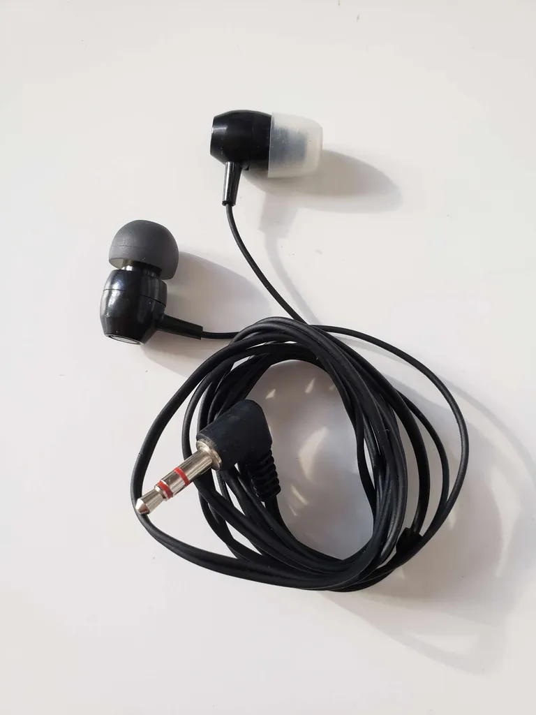 headphones -- simple wired audio mismatched white and black c... photo 1