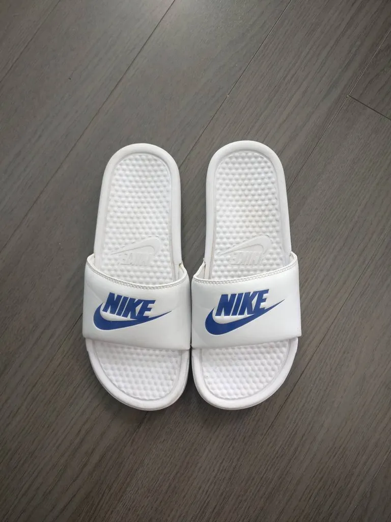 Pending Nike Slides Size 9 Women / Size 7 Men photo 1