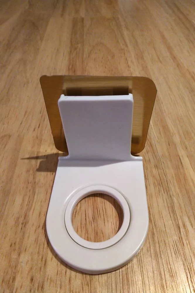 Stick On Wall Holder For Pump photo 1