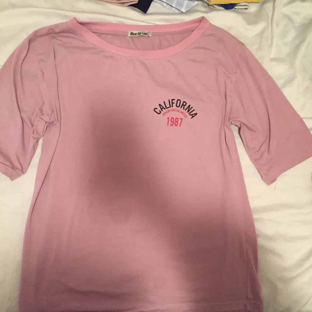 Pink oversized graphic top photo 1