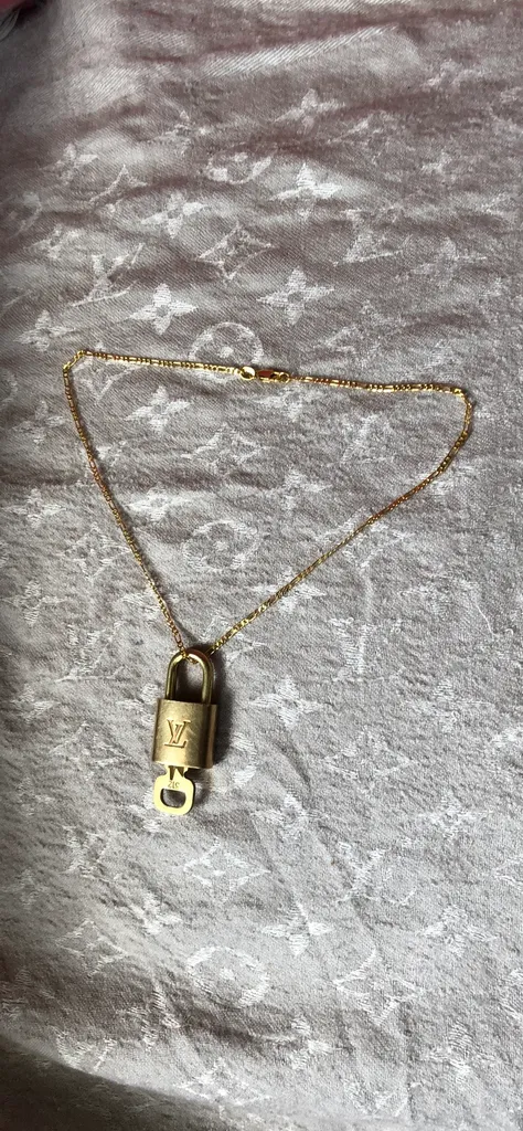 Authentic Louis Vuitton Lock On Chain photo 1