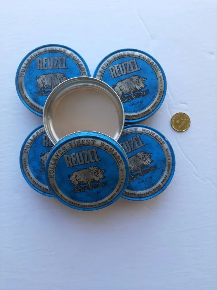 Empty Ruzel Tins photo 1