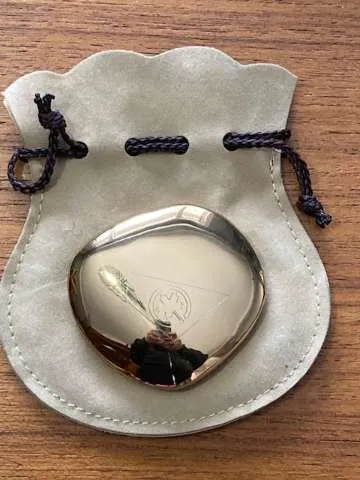 Heavy gold paperweight photo 1