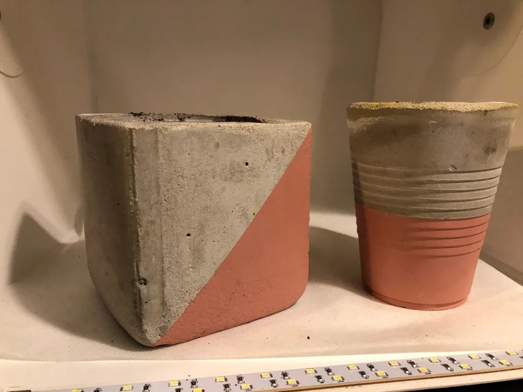 Two Small Cement Planters photo 1