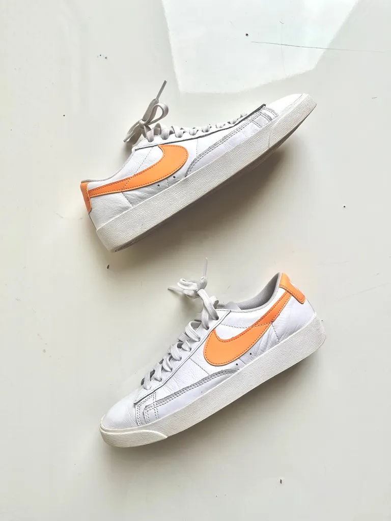 Tangerine Swoop Nikes photo 1