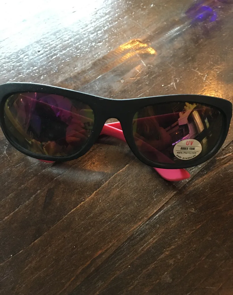 Brand New Sunglasses With Pink Arms photo 1