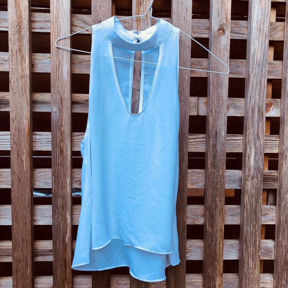 Sleeveless White Top - Size s/m photo 1