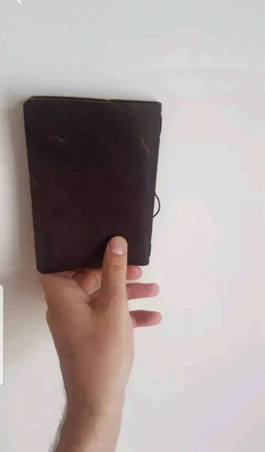 Beautifully aged leather notebook photo 1