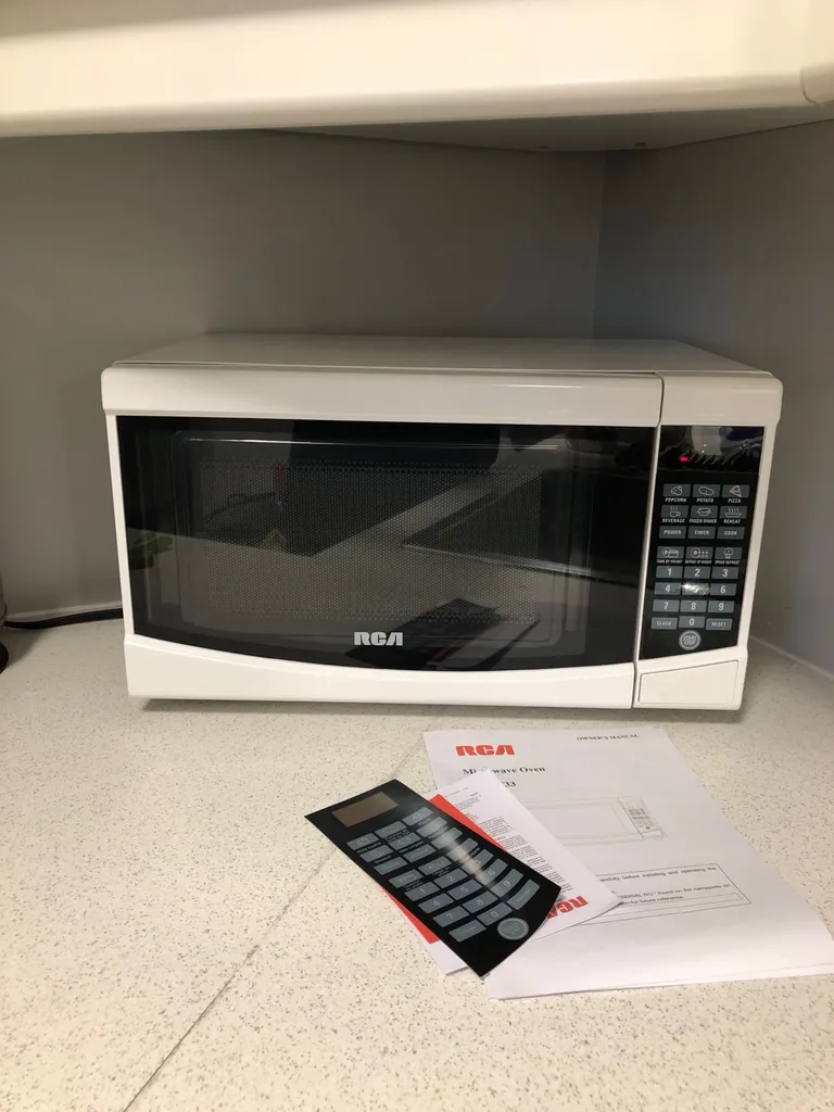 RCA RMW733 0.7 cu. ft. Countertop Microwave in White photo 1